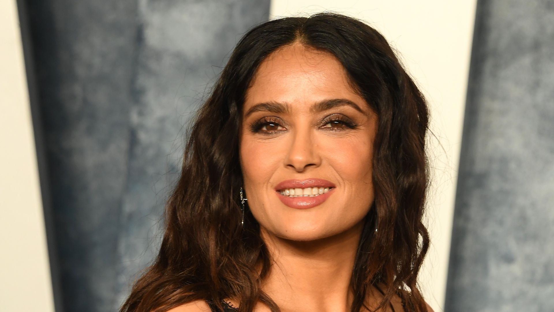Salma Hayek almost bares all as she dances in just a bathrobe - watch | HELLO!